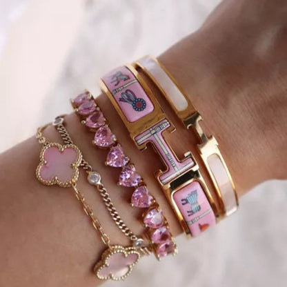 TENNISARMBAND MIT ROSÉ-HERZ